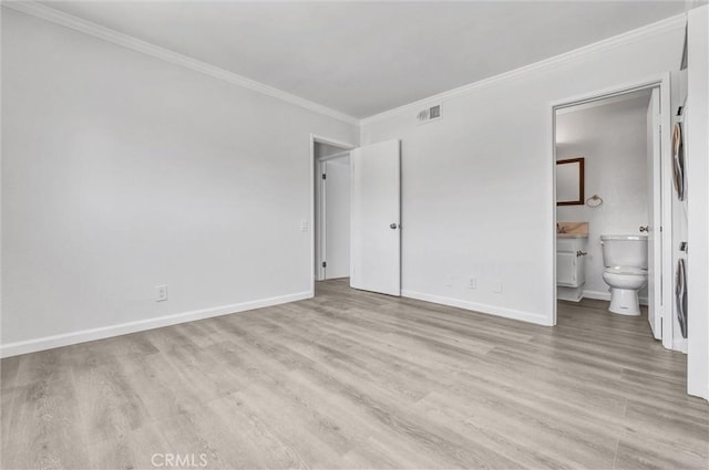 250 W Spazier Ave Unit 209, Burbank, CA 91502 - unfurnished bedroom featuring light wood-style flooring, crown molding, and ensuite bathroom