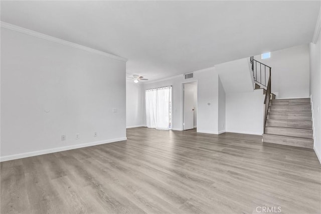 250 W Spazier Ave Unit 209, Burbank, CA 91502 - unfurnished living room with ornamental molding, stairway, wood finished floors, and ceiling fan