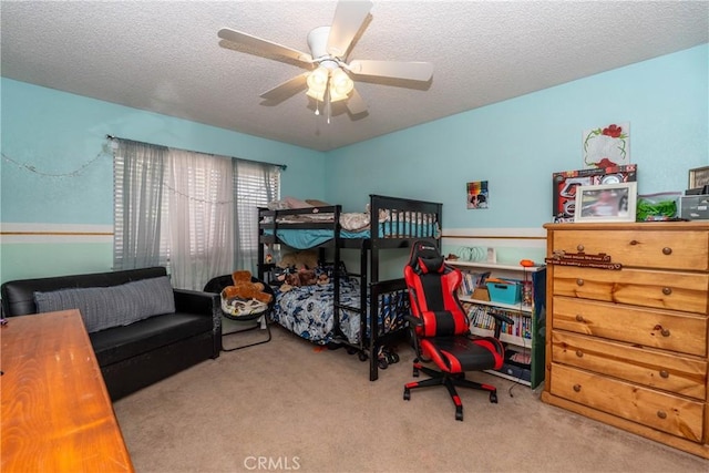 1267 Joshua Tree Dr, Barstow, CA 92311 - carpeted bedroom featuring a textured ceiling and ceiling fan