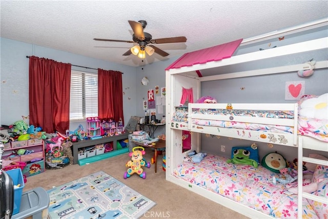 1267 Joshua Tree Dr, Barstow, CA 92311 - bedroom featuring carpet floors, a textured ceiling, and ceiling fan