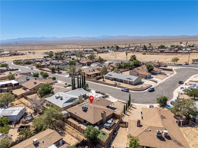 1267 Joshua Tree Dr, Barstow, CA 92311 - aerial perspective of suburban area with mountains