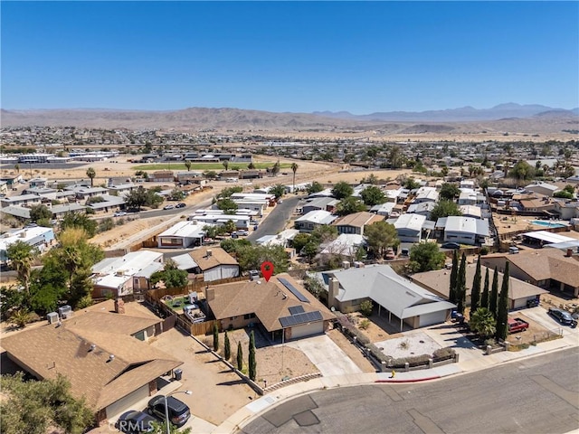 1267 Joshua Tree Dr, Barstow, CA 92311 - aerial perspective of suburban area with a mountain backdrop