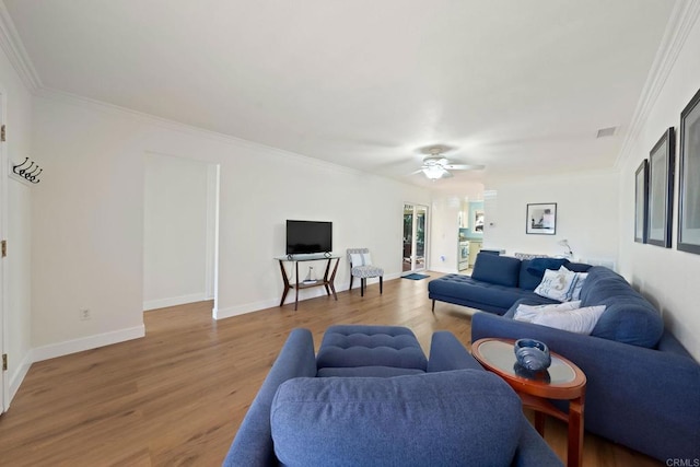 4562 Golden Ridge Dr, Oceanside, CA 92056 - living room with wood finished floors, ornamental molding, and ceiling fan