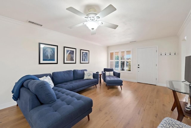 4562 Golden Ridge Dr, Oceanside, CA 92056 - living room featuring light wood-style flooring, a ceiling fan, and ornamental molding