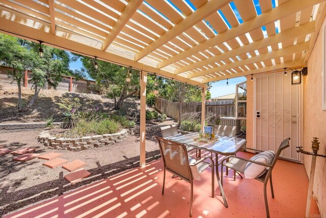 4562 Golden Ridge Dr, Oceanside, CA 92056 - fenced backyard with outdoor dining area, a patio, and a pergola
