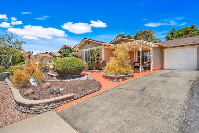 4562 Golden Ridge Dr, Oceanside, CA 92056 - ranch-style home with a garage, stucco siding, and asphalt driveway