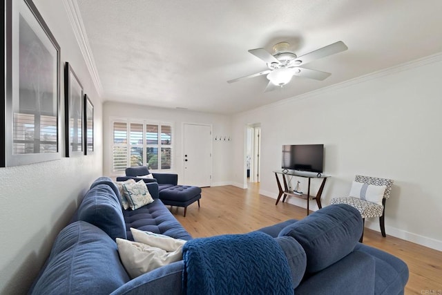 4562 Golden Ridge Dr, Oceanside, CA 92056 - living room with crown molding, light wood finished floors, and a ceiling fan