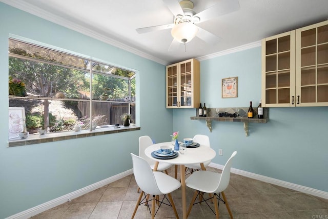 4562 Golden Ridge Dr, Oceanside, CA 92056 - dining area with crown molding, tile patterned floors, and ceiling fan