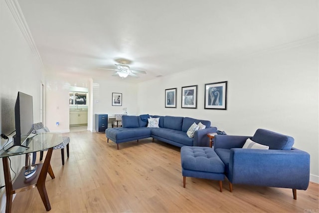 4562 Golden Ridge Dr, Oceanside, CA 92056 - living room with crown molding, light wood-type flooring, and ceiling fan