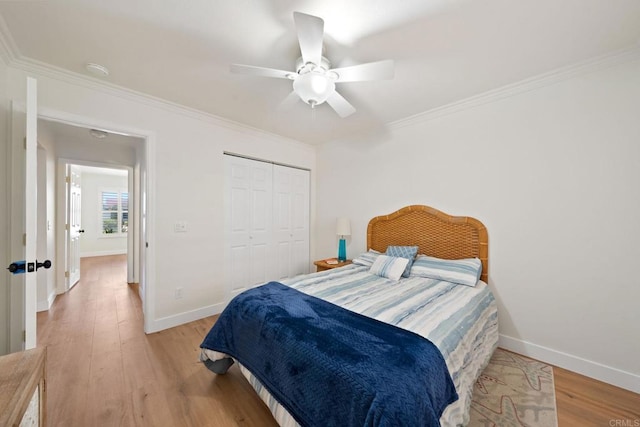 4562 Golden Ridge Dr, Oceanside, CA 92056 - bedroom with ornamental molding, wood finished floors, a closet, and ceiling fan