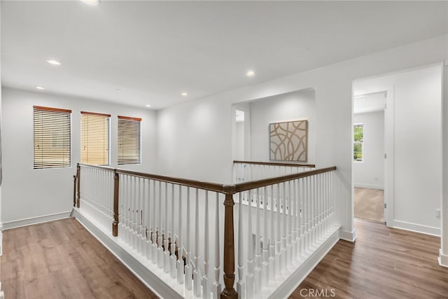 19162 Lauren Ln, Saugus, CA 91350 - corridor featuring wood finished floors, recessed lighting, and an upstairs landing