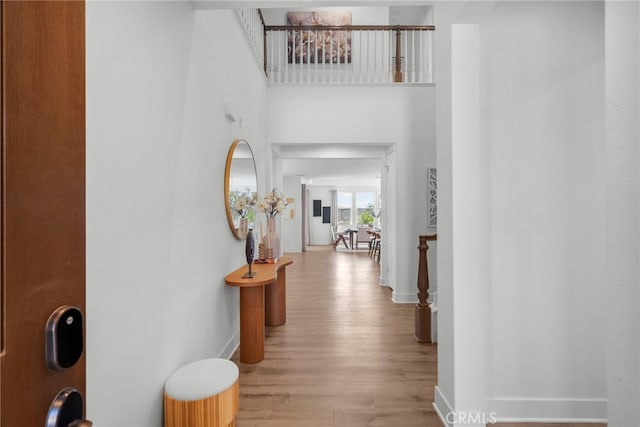 19162 Lauren Ln, Saugus, CA 91350 - corridor featuring wood finished floors and a high ceiling