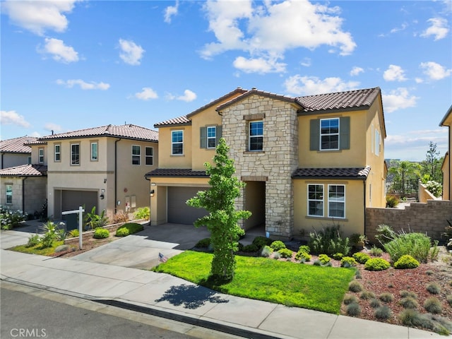 19162 Lauren Ln, Saugus, CA 91350 - view of front of house with stucco siding, a tile roof, an attached garage, concrete driveway, and stone siding