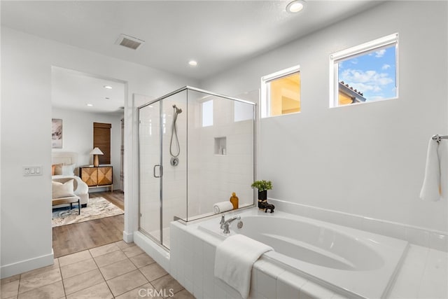 19162 Lauren Ln, Saugus, CA 91350 - ensuite bathroom featuring a bath, a stall shower, recessed lighting, and tile patterned flooring