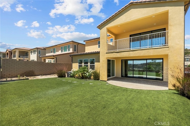 19162 Lauren Ln, Saugus, CA 91350 - back of house with a balcony, stucco siding, a putting green, and a tile roof