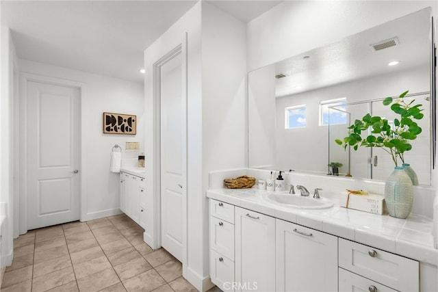 19162 Lauren Ln, Saugus, CA 91350 - full bathroom featuring vanity, a shower stall, and tile patterned floors