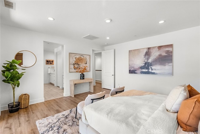 19162 Lauren Ln, Saugus, CA 91350 - bedroom featuring wood finished floors, recessed lighting, and ensuite bath