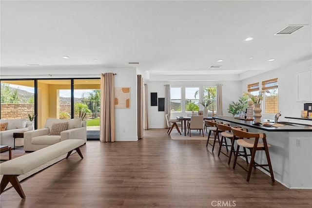 19162 Lauren Ln, Saugus, CA 91350 - living area with dark wood-type flooring and recessed lighting