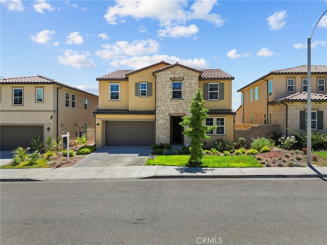 19162 Lauren Ln, Saugus, CA 91350 - view of front of house with stucco siding, an attached garage, concrete driveway, and stone siding