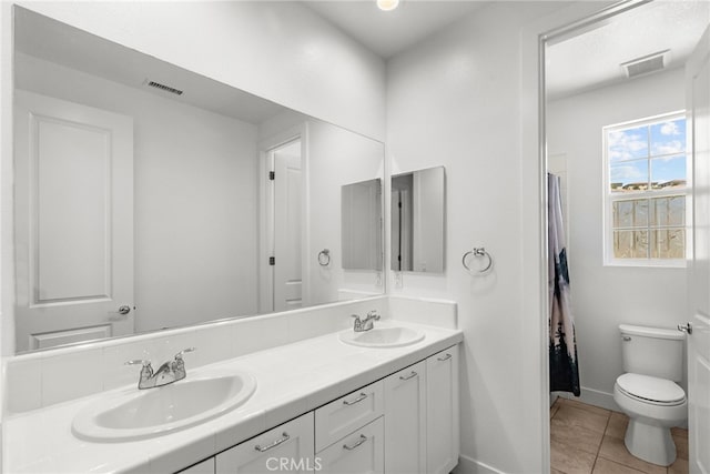 19162 Lauren Ln, Saugus, CA 91350 - bathroom with double vanity and tile patterned floors