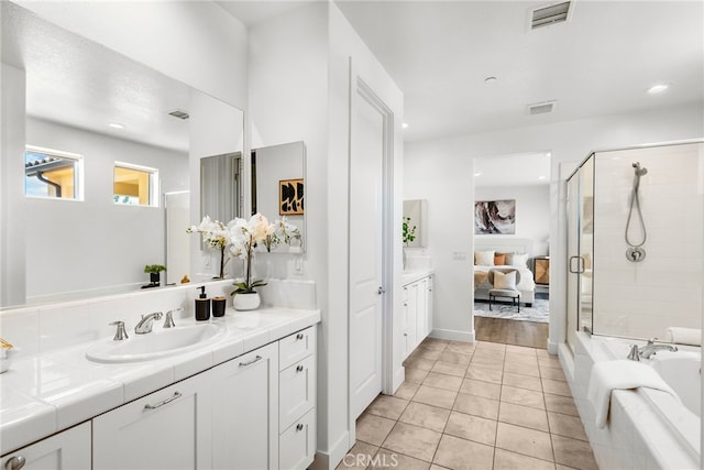 19162 Lauren Ln, Saugus, CA 91350 - full bathroom featuring vanity, ensuite bathroom, a shower stall, a bath, and tile patterned flooring