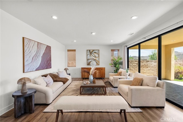 19162 Lauren Ln, Saugus, CA 91350 - living area featuring wood finished floors and recessed lighting
