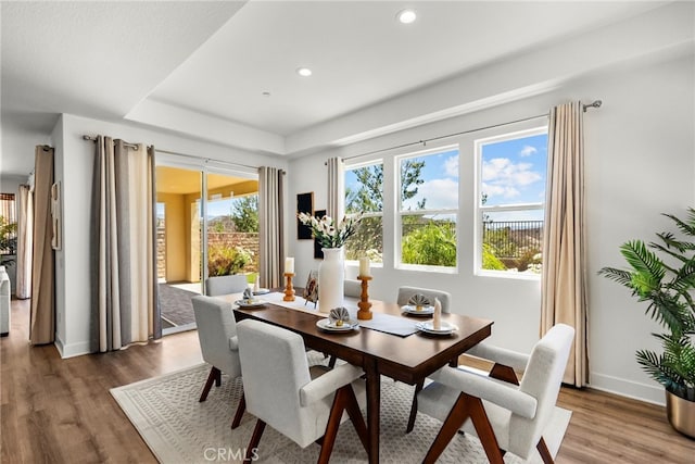 19162 Lauren Ln, Saugus, CA 91350 - dining area featuring wood finished floors, recessed lighting, and a tray ceiling