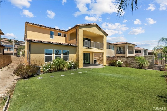 19162 Lauren Ln, Saugus, CA 91350 - rear view of property featuring a balcony, stucco siding, a tile roof, and a patio