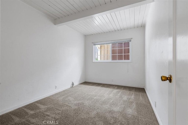 2516 Greta Pl, San Luis Obispo, CA 93401 - carpeted empty room with baseboards and a wood ceiling with exposed beams