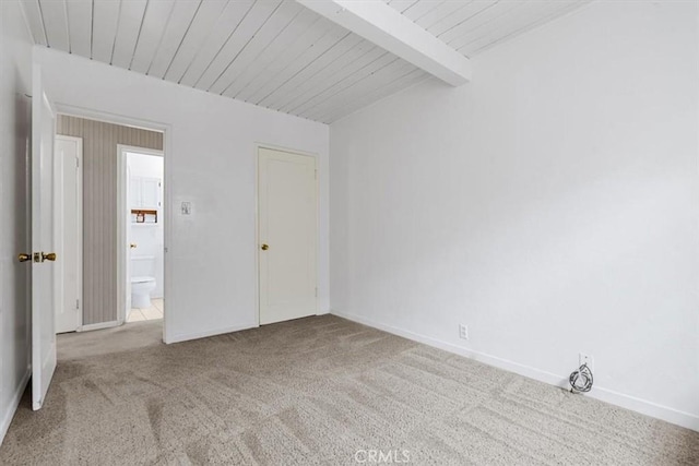 2516 Greta Pl, San Luis Obispo, CA 93401 - carpeted empty room featuring baseboards and a wood ceiling with exposed beams