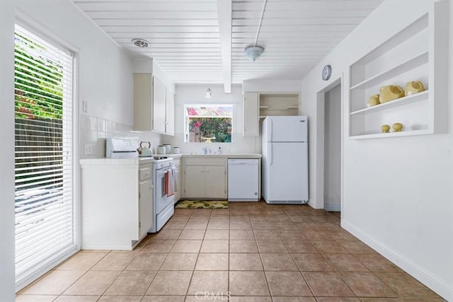 2516 Greta Pl, San Luis Obispo, CA 93401 - kitchen featuring white appliances, tile countertops, white cabinets, light tile patterned floors, and built in shelves