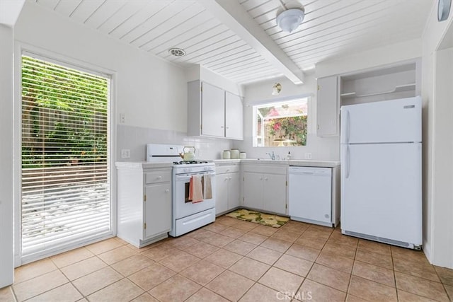 2516 Greta Pl, San Luis Obispo, CA 93401 - kitchen featuring white appliances, light countertops, light tile patterned flooring, white cabinetry, and a wood ceiling with exposed beams