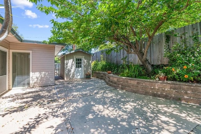 2516 Greta Pl, San Luis Obispo, CA 93401 - fenced backyard with a shed and a patio area