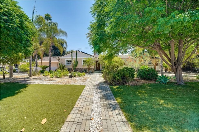 8084 Magnolia Ave, Riverside, CA 92504 - view of front of home with a front lawn