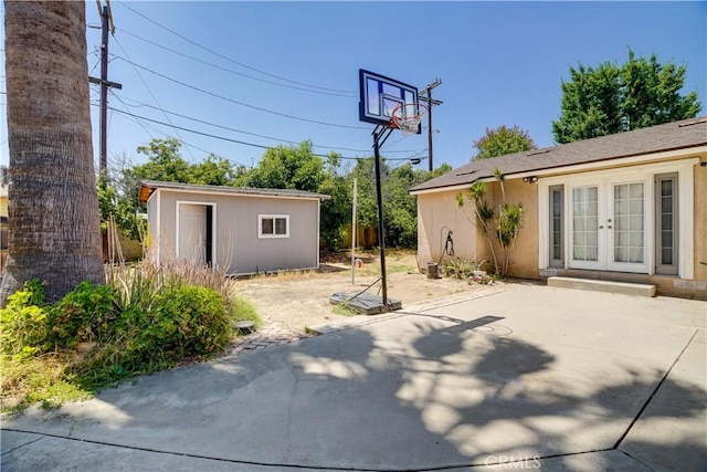 8084 Magnolia Ave, Riverside, CA 92504 - view of patio featuring french doors and an outdoor structure
