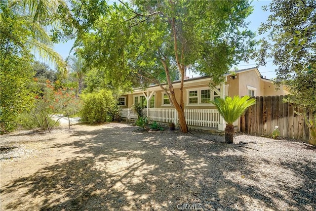8084 Magnolia Ave, Riverside, CA 92504 - rear view of house featuring stucco siding