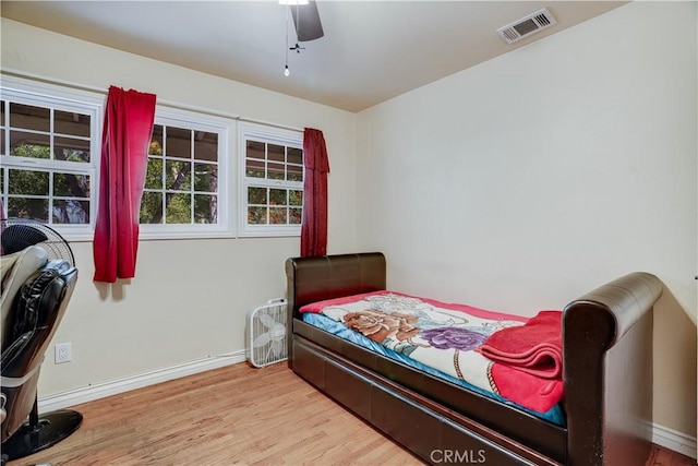 8084 Magnolia Ave, Riverside, CA 92504 - bedroom featuring wood finished floors and ceiling fan