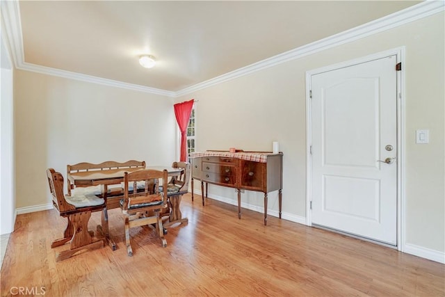 8084 Magnolia Ave, Riverside, CA 92504 - dining room featuring light wood finished floors and crown molding