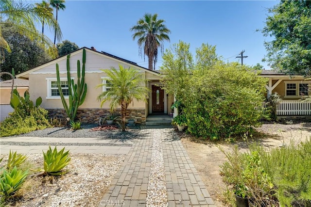 8084 Magnolia Ave, Riverside, CA 92504 - view of front of house featuring stucco siding and stone siding