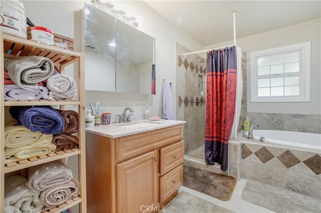 8084 Magnolia Ave, Riverside, CA 92504 - bathroom with vanity, tiled shower, a relaxing tiled tub, and tile patterned floors