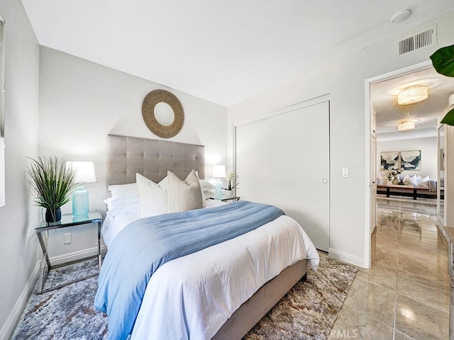 28191 Sorrento Unit 111, Laguna Niguel, CA 92677 - bedroom featuring baseboards and a closet