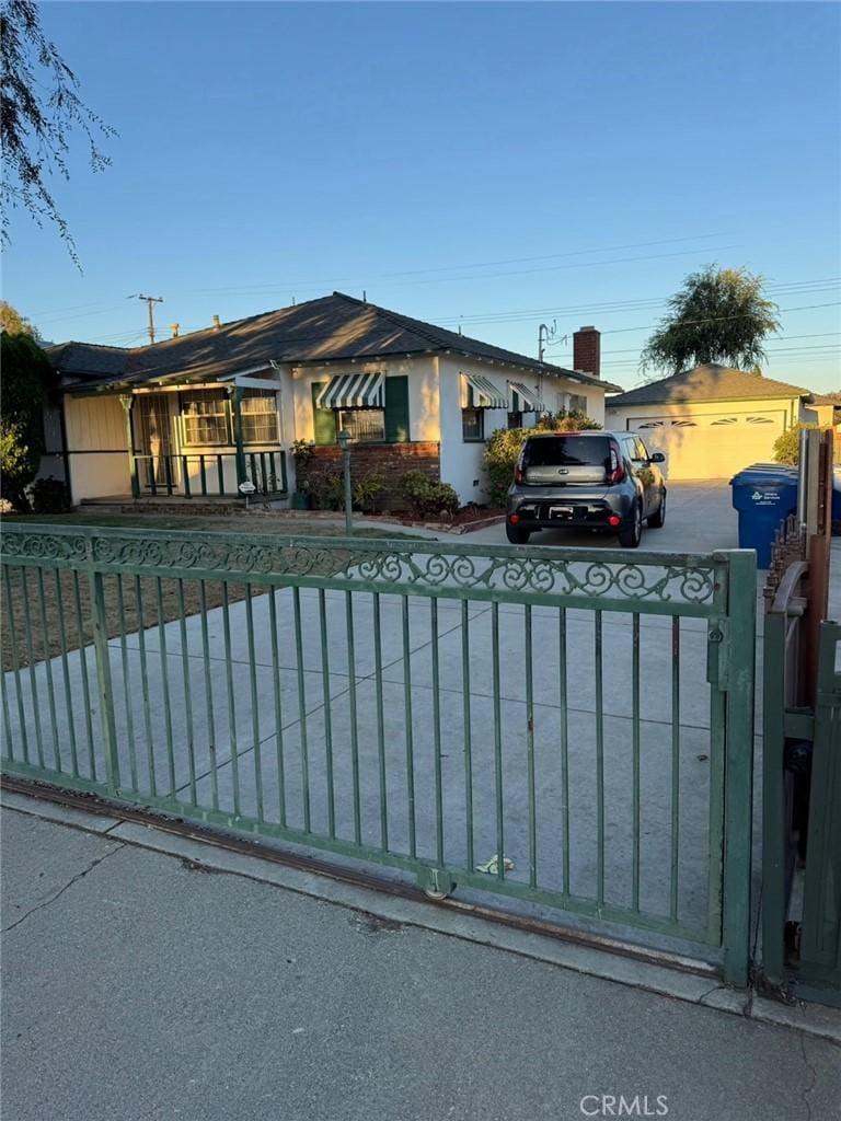 2220 Las Vegas Ave, Pomona, CA 91767 - ranch-style home featuring concrete driveway and stucco siding
