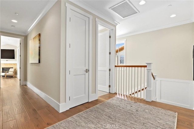 716 Elvira Ave Unit A, Redondo Beach, CA 90277 - hall featuring ornamental molding, an upstairs landing, wood finished floors, and recessed lighting