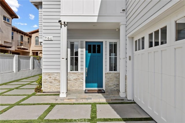 716 Elvira Ave Unit A, Redondo Beach, CA 90277 - view of exterior entry with board and batten siding and stone siding
