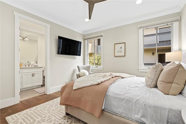 716 Elvira Ave Unit A, Redondo Beach, CA 90277 - bedroom featuring crown molding, wood finished floors, recessed lighting, and connected bathroom