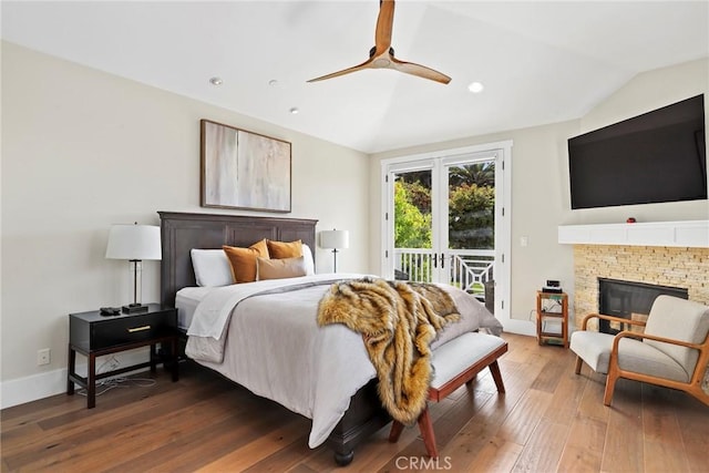 716 Elvira Ave Unit A, Redondo Beach, CA 90277 - bedroom featuring access to outside, vaulted ceiling, wood-type flooring, recessed lighting, and a fireplace