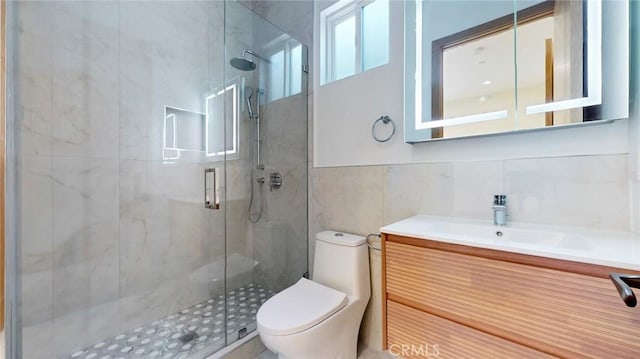 421 N Catalina St, Burbank, CA 91505 - bathroom with a shower stall, tile walls, and vanity