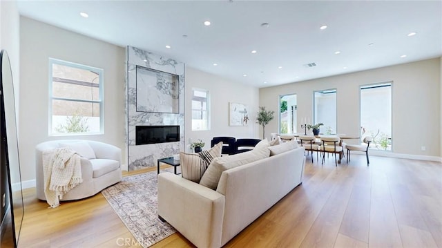 421 N Catalina St, Burbank, CA 91505 - living room with a fireplace, recessed lighting, and light wood-style floors