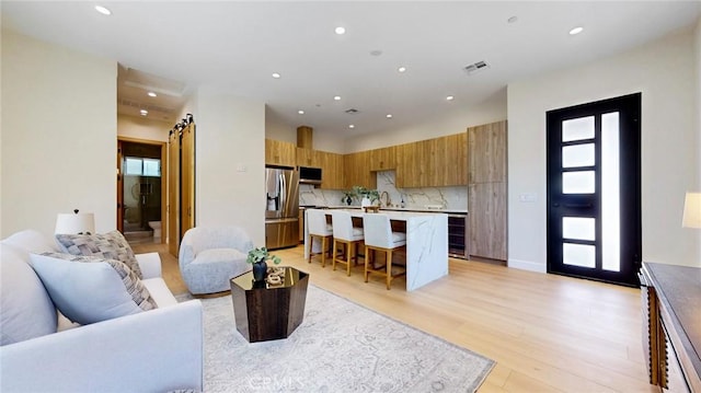 421 N Catalina St, Burbank, CA 91505 - living area with recessed lighting, wine cooler, light wood finished floors, and plenty of natural light