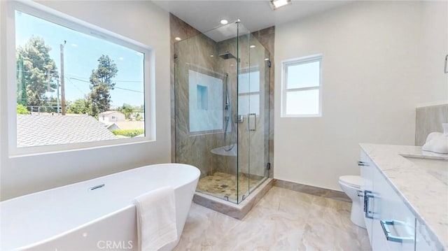 421 N Catalina St, Burbank, CA 91505 - full bathroom with a freestanding tub, vanity, a shower stall, recessed lighting, and marble finish floors